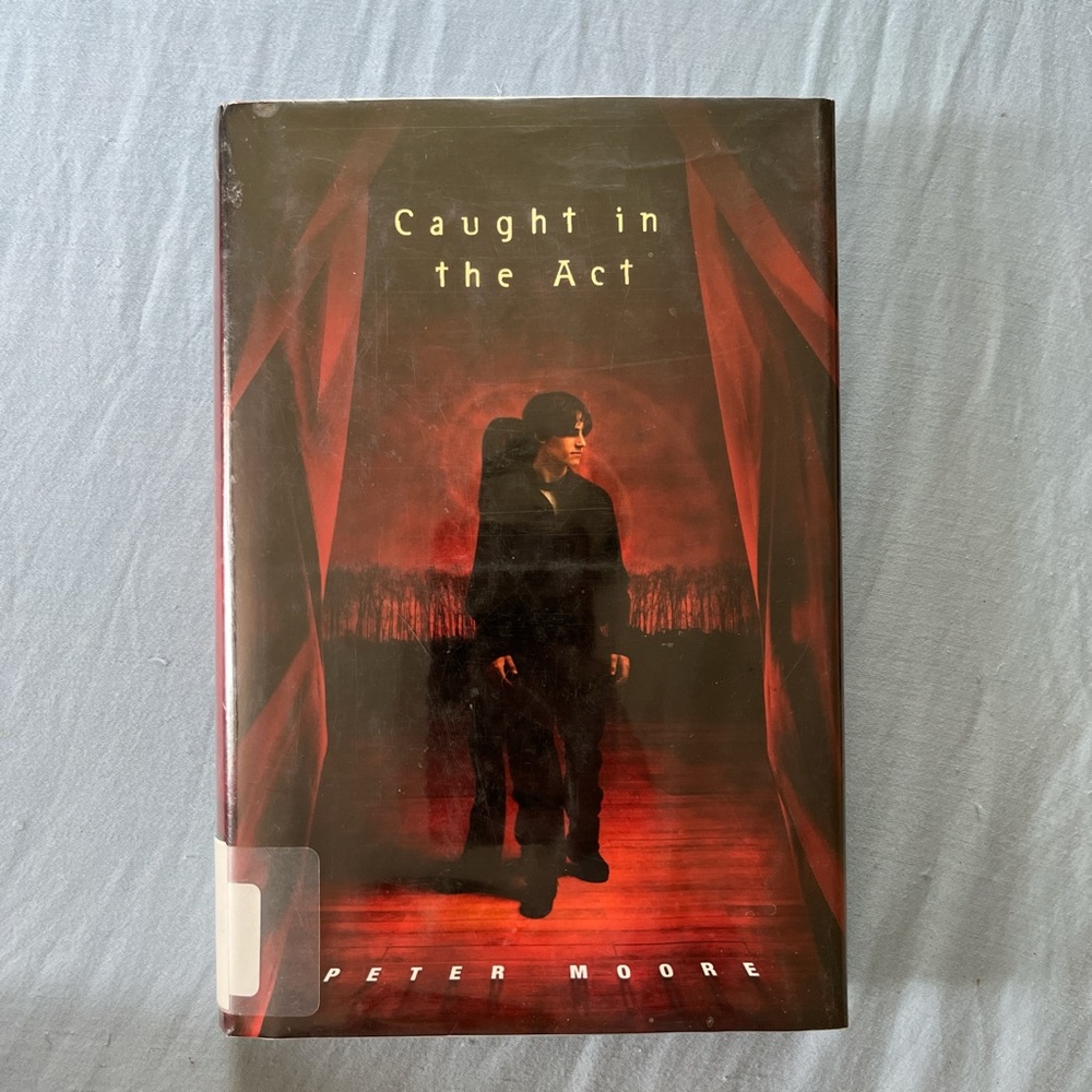 Caught in the Act Hardcover Book